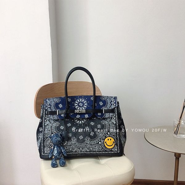 

minority fashion blue smiling face beggar cashew nut flower denim canvas kelly hand underarm bag girl