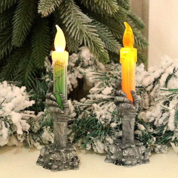 

party decoration ghost hand candle light halloween glowing candles horror props atmosphere venue scene haunted house lighting lamp