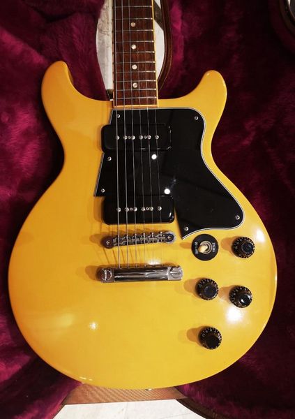

double cutaway junior 1959 special tv yellow electric guitar black pickguard, p90 pickups, wrap arround tailpiece, vintage tuners