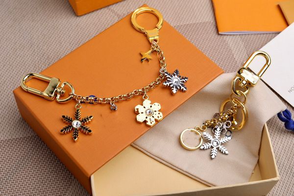 

snow luxurys key chain buckle lovers car keychain handmade leather designers keychains men women bag pendant accessories 10 color, Silver