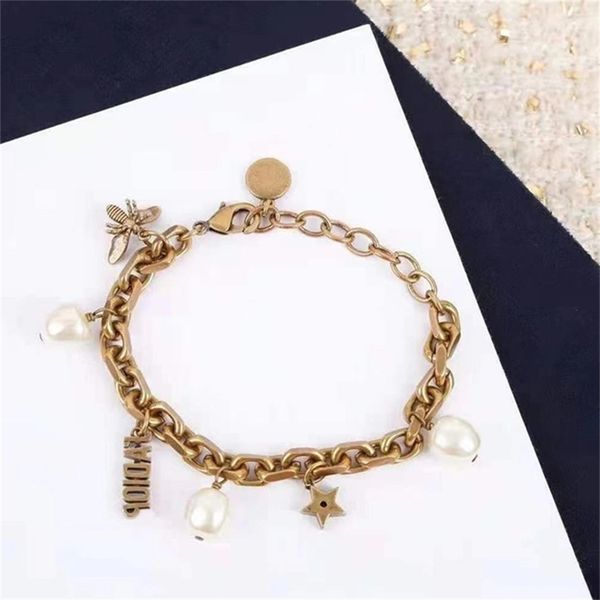 

88% off wholesale store 2022 home simple pearl star bracelet women's brass high version hand decoration, Black
