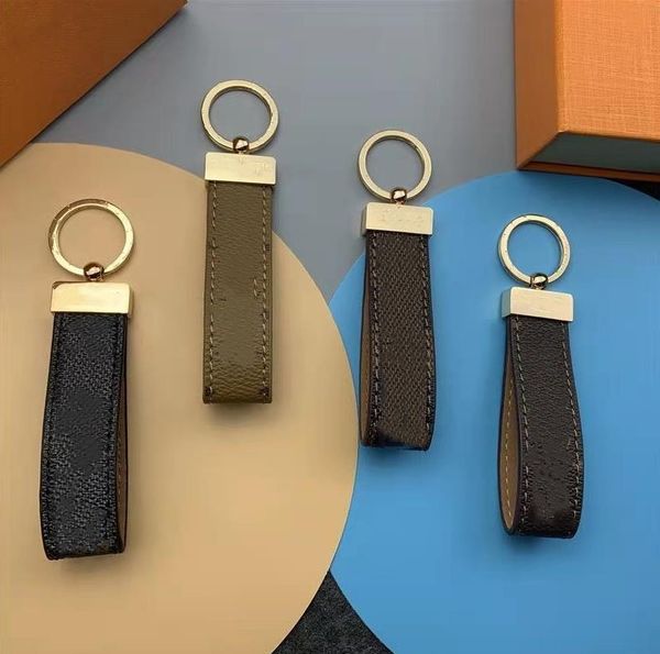 

2022 designer keychain key chain buckle keychains lovers car handmade leather men women bags pendant accessories 4 color 65221, Silver