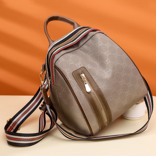 

luxury designer new simple backpack printed casual shoulder bag versatile shell high capacity women's student