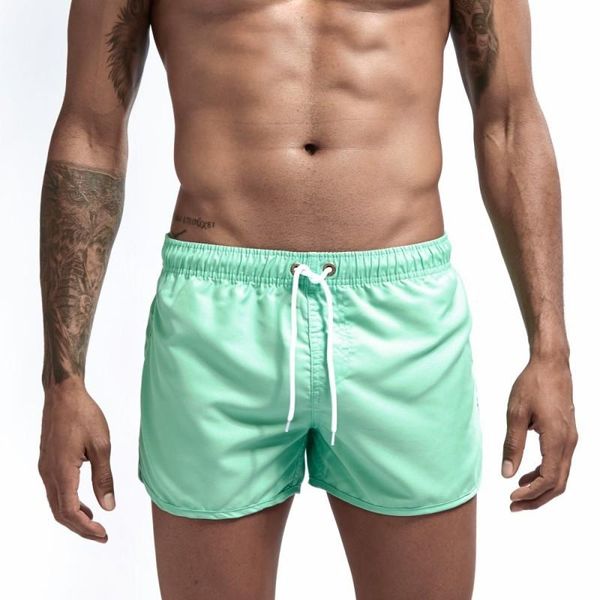 

men's shorts men casual breathable quick dry pants pockets beach solid color sport short summer male pant with pocket, White;black