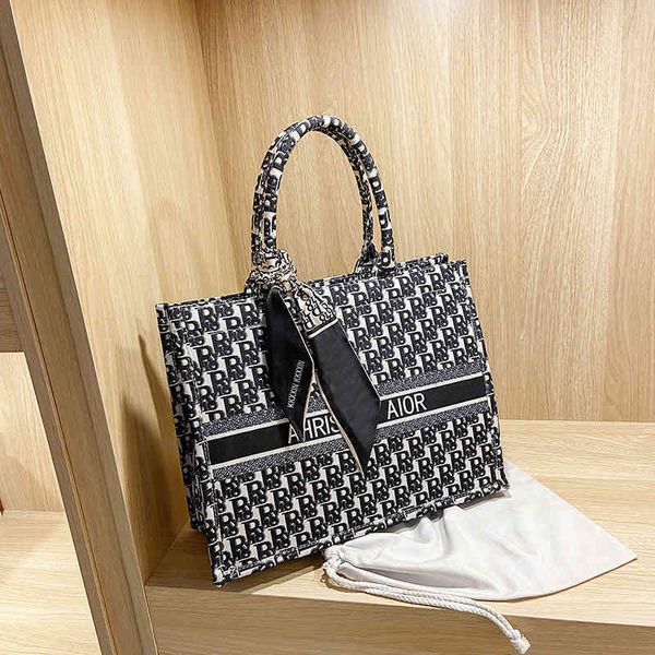 

2022 factory wholesale new large capacity bag women's portable shopping spring and summer canvas feeling popular atmosphere tote bag gn, Black;red