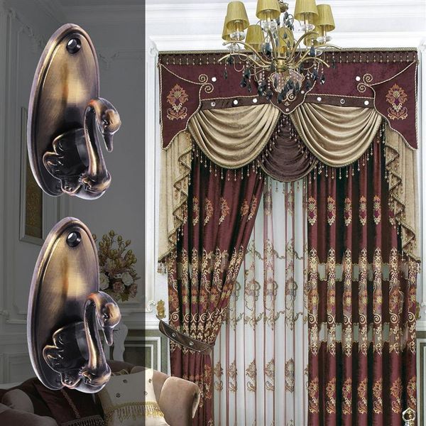 

pair of swan style drapery curtain holdbacks tieback hooks (antique brass)