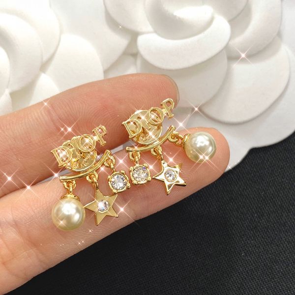 

2021 luxury designer jewelry / new asymmetric pearl star earrings short tassel fashion 9s25 pure silver earrings for women