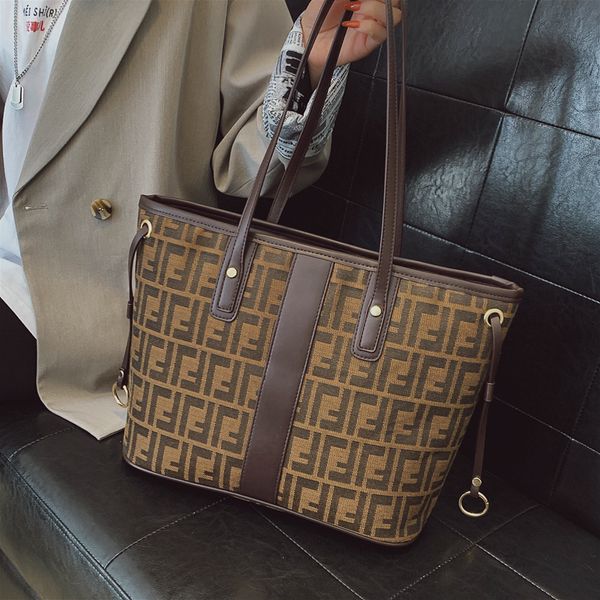 

designer handbags one shoulder women's new 2021 large capacity shopping handbag net red ins commuter tote bag trend