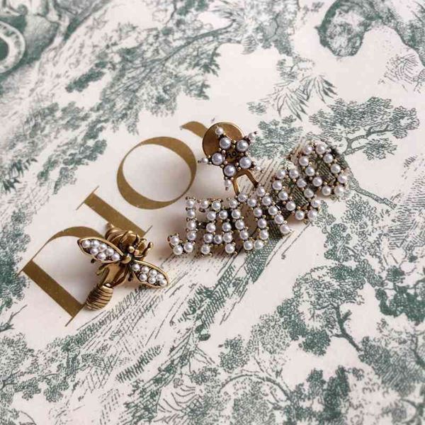 

75% off outlet online new letter pearl bee high version 925 silver needle simple earrings