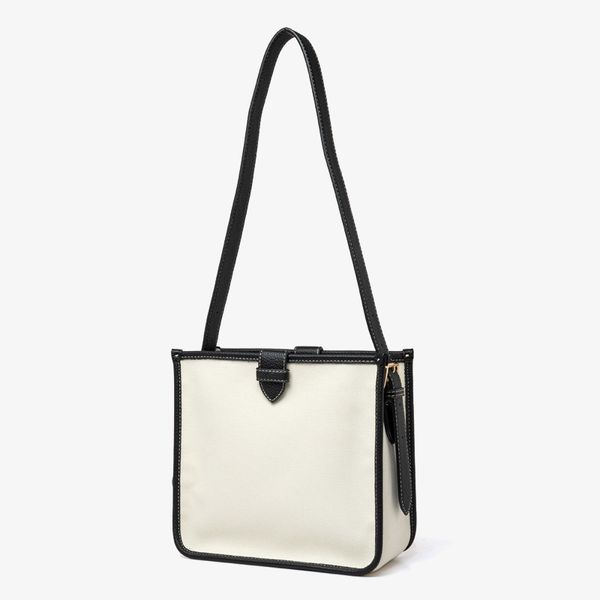 

design hand women's new summer 2021 korean commuting canvas cowhide shoulder bag leisure campus student bao guofeng 05nr