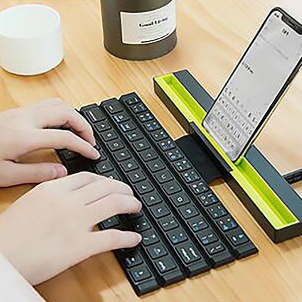 

keyboards wireless keyboard mini foldable for tablet phones 64 keys portable bluetooth stand in stock