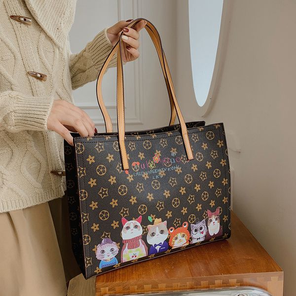 

factory direct sale 75% off women's 2021 new atmosphere small square one shoulder armpit urban elegant cat letter women bags
