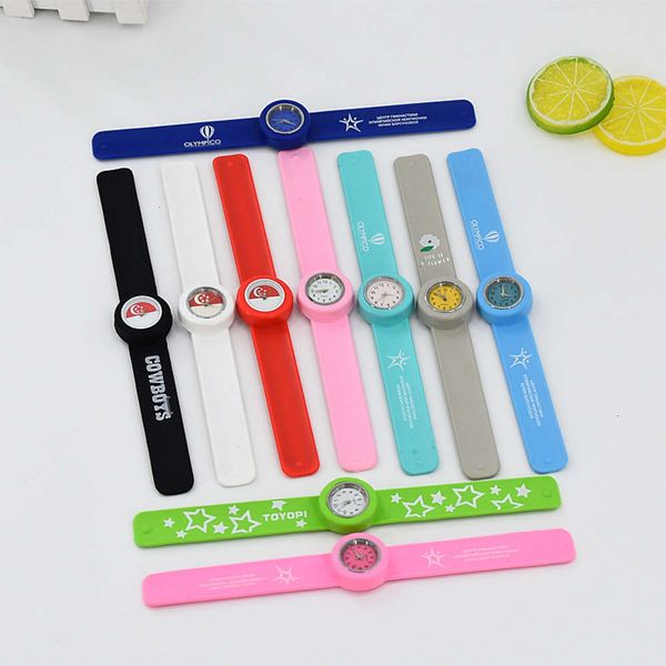 

quartz students ring silicone snap watch and leisure children clap spring bracelet watch, Slivery;brown