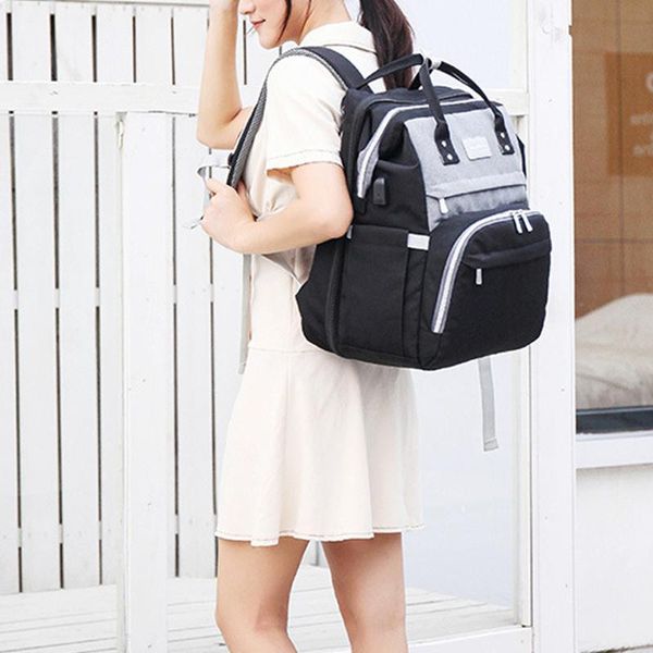 

diaper bags portable folding baby crib multifunctional large mom bag travel backpack bed changing table