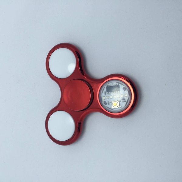 

2021 fingertip gyro luminous led with light three-leaf between fingers 32 changeable pattern bluetooth music crystal toy