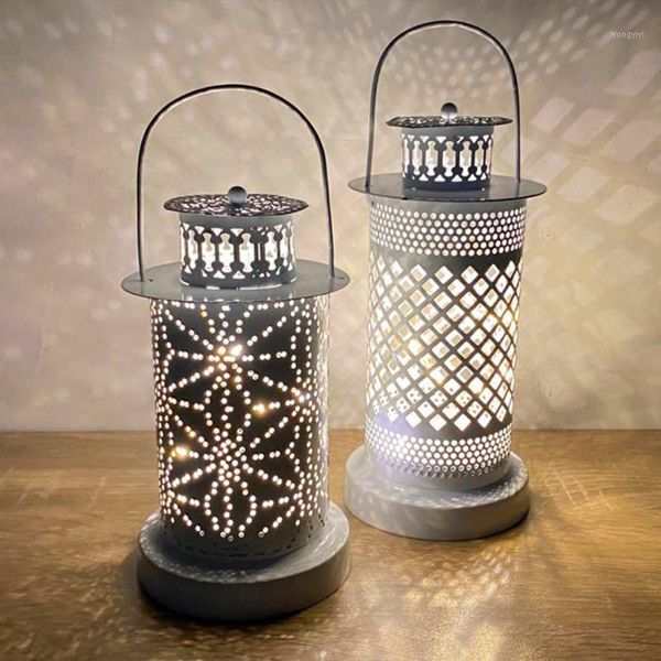 

portable lanterns retro led candle lamp hollowed out hanging lantern with handle vintage pattern shadow shaped outdoor lighting1