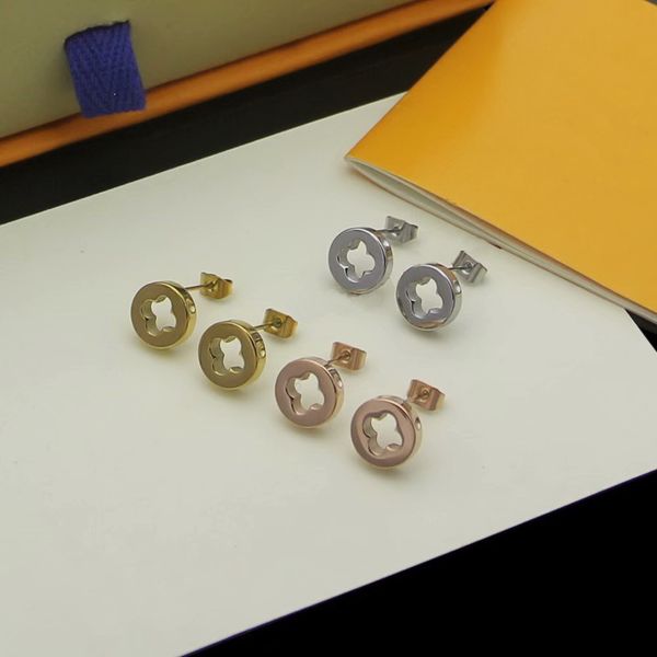 

europe america simple style lady women titanium steel v initials hollow out stud earrings 3 color, Golden;silver