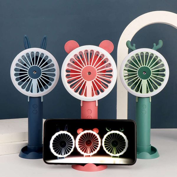 

noctilucent spray, handheld mini fan, charging, folding portable electric student dormitory, cute cartoon fan.