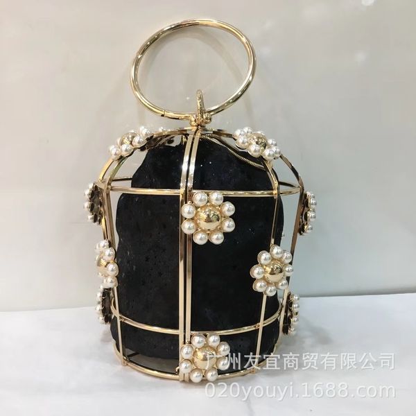 

handbag designers bags dinner bag the same kind of water diamond bag, metal inlaid birdcage dinner pearl hollowed out hand bag