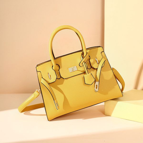 

niche design fashion women's new portable single shoulder high capacity tote messenger bag