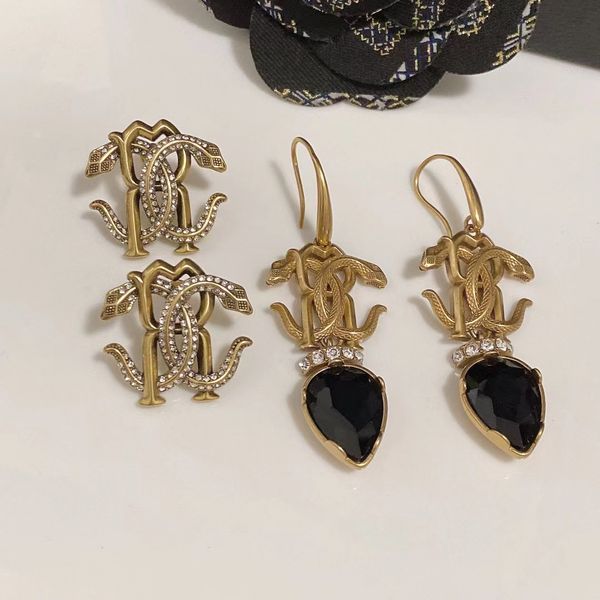 

double snake bronze gold-plated distressed crystal diamond earrings, Silver