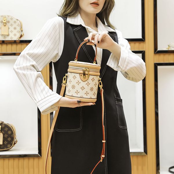 

cylinder women's bag 2021 fashion messenger net red mini portable embossed