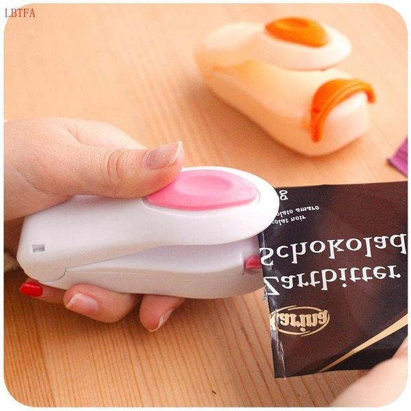 

mini handheld holder electric heating snack sealing machine machine sealed packaging plastic bag sealed bag