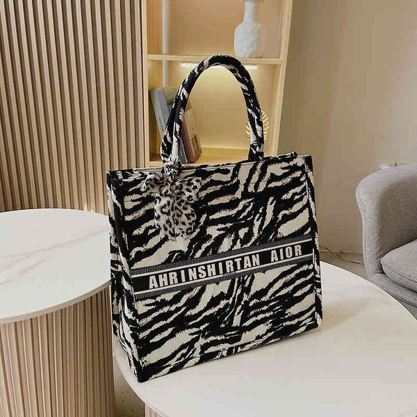 

2022 factory wholesale new women's shoulder stripe canvas shoulder bag fashion work hand student tutorial bag 5pn1