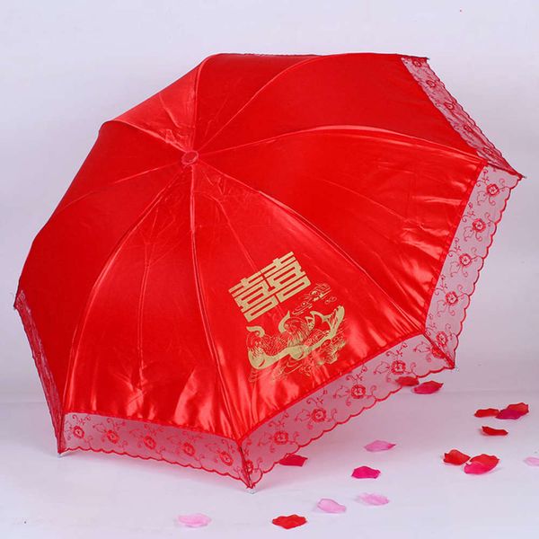 

red umbrella for bride's wedding three fold lace red