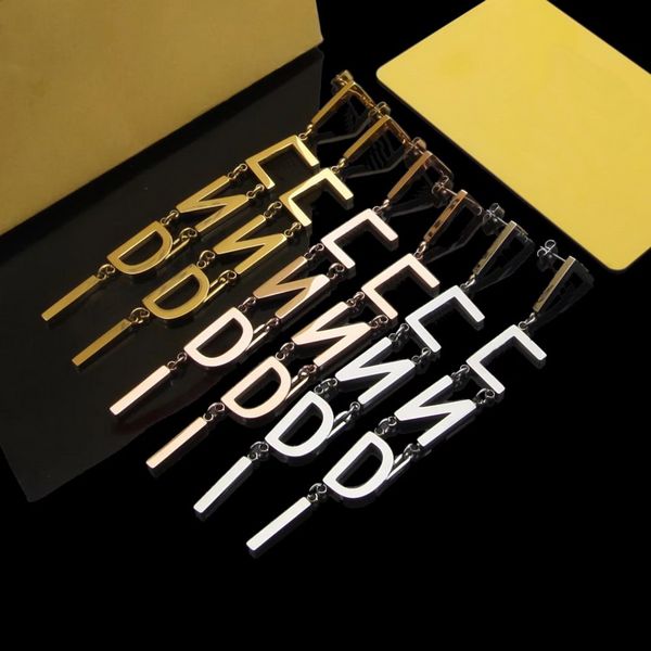 

europe america fashion style lady women gold/silver/rose color hardware letter tassels long stud dangle earrings