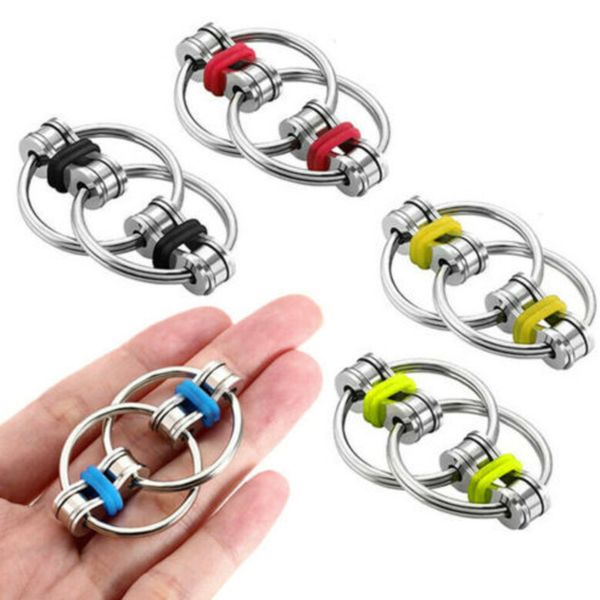 

100pcs/dhl fidget bike chain ring flip finger spinner keychain adhd sensory autism stress relief key ring metal finger fun toy 2021 h39xe77