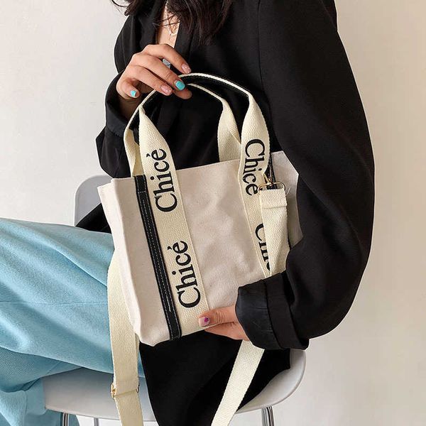 

popular canvas bag women's 2021 spring fashion net red messenger large capacity portable tote bag