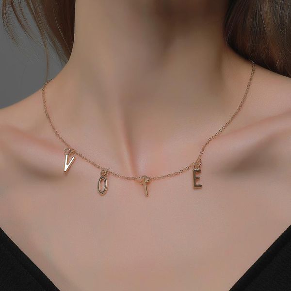 

pendant necklaces todorova former first lady of the united states michelle obama wears initial letters same vote necklace om equality, Silver
