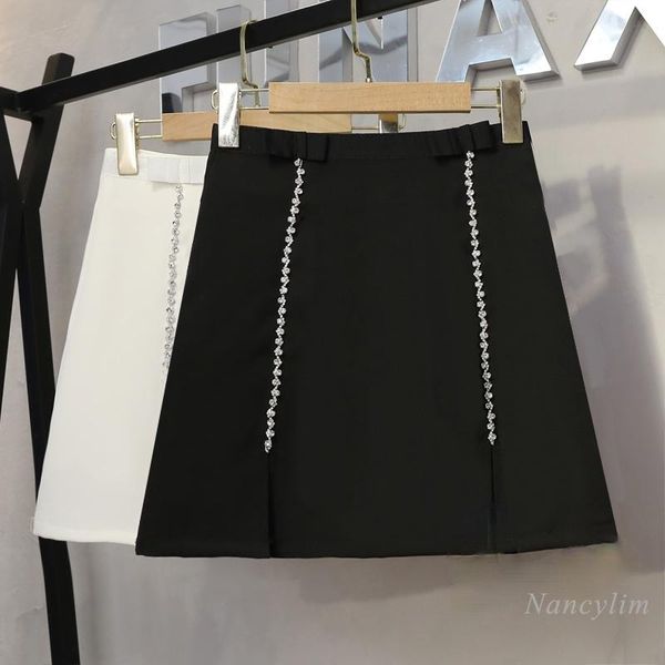 

skirts 2021 summer bow rhinestone high waist slit hip skirt woman a- line anti-emptied pantskirt office lady juper white black