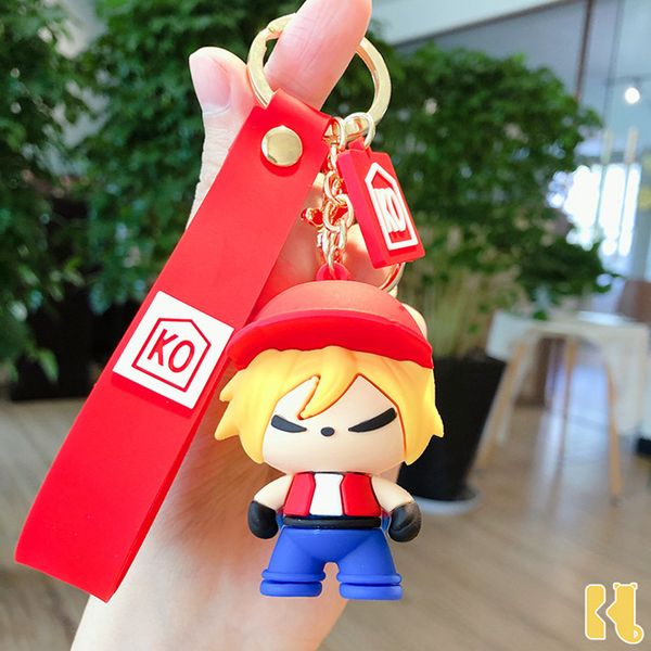 Jogo clássico do anime dos desenhos animados KOF Rei dos combatentes Keychain líquido Red Red Boys e meninas Bag Ornaments Creative Key Anel Acessórios Presente