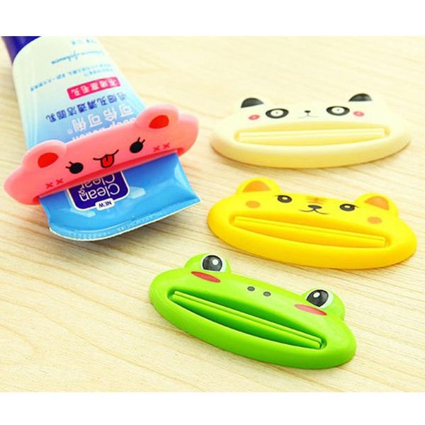 

1pcs toothpaste squeezer press tube dentifrice dispenser kitchen bathroom accessories cartoon roll holder toothbrush holders