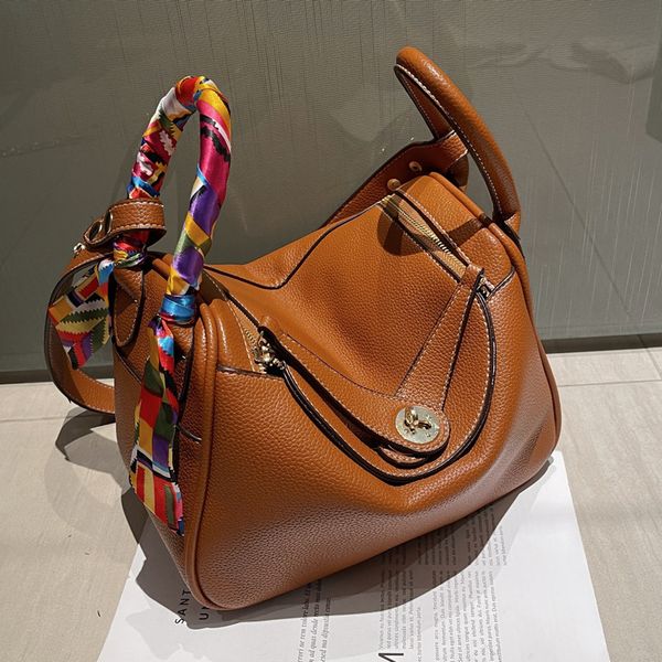 

factory direct sale 75% off high sense litchi pattern female 2021 autumn new foreign style portable one shoulder messenger pillow bags