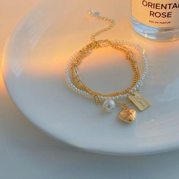 

charm bracelets girly heart pearl shell bracelet three-layer chain shaped pendant niche design for women, Golden;silver
