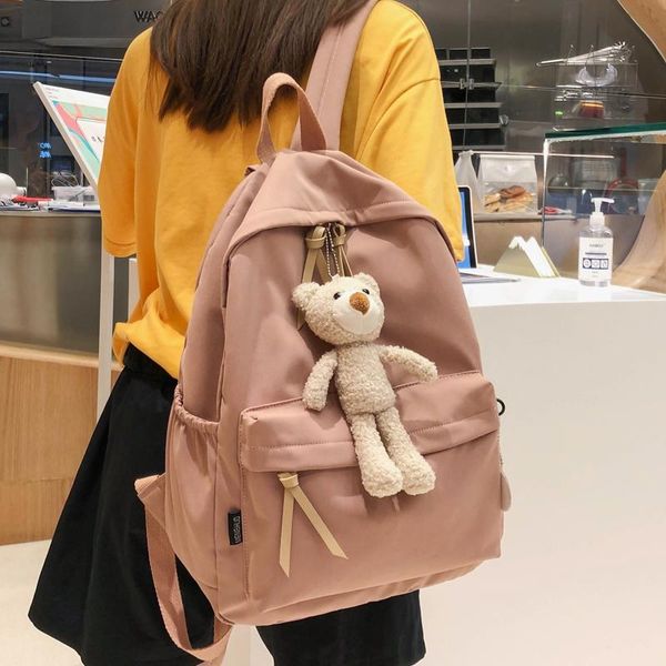 

backpack japanese girl junior high school student bag korean 2021 cute solid color nylon female bear doll