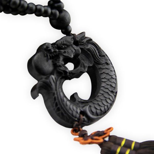 

prayer dragon sculpture ebony wood carving crafts car pendant hang decorations chinese fengshui