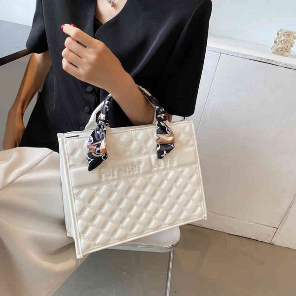 

2022 factory wholesale new korean fashion ribbon portable bag ins net red simple tote bag zznm