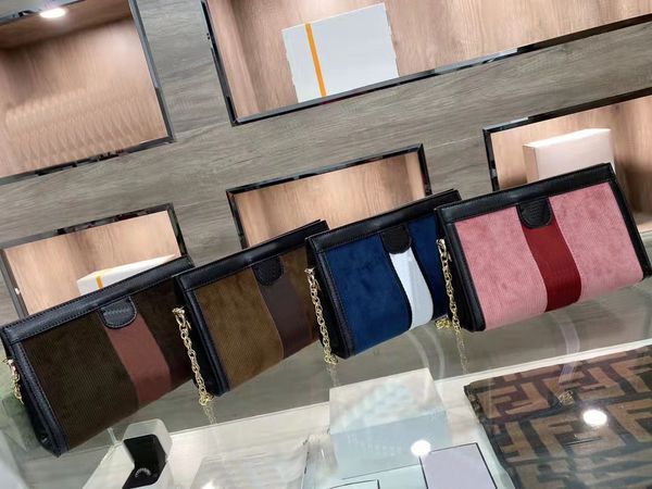 

designer designed messenger bag. leather + striped cloth surface. size: 23x19cm.