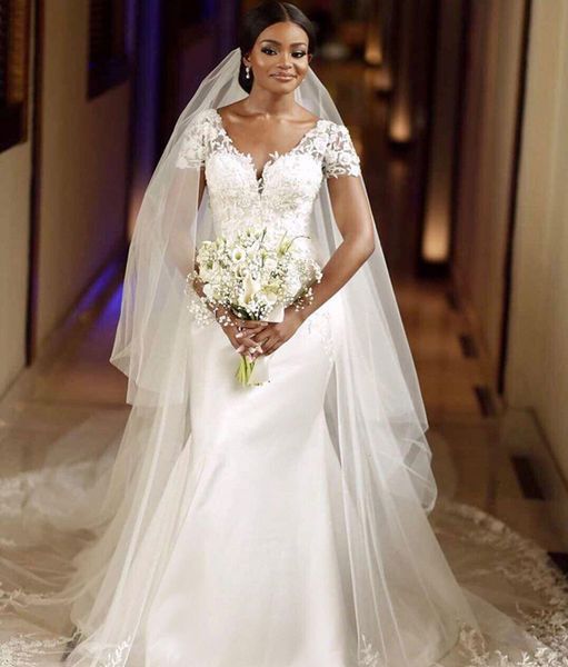 

2021 new mermaid african wedding es with oveskirt v neck short sleeve sweep train appliques garden bridal gowns vestidos de novia yvmz, White