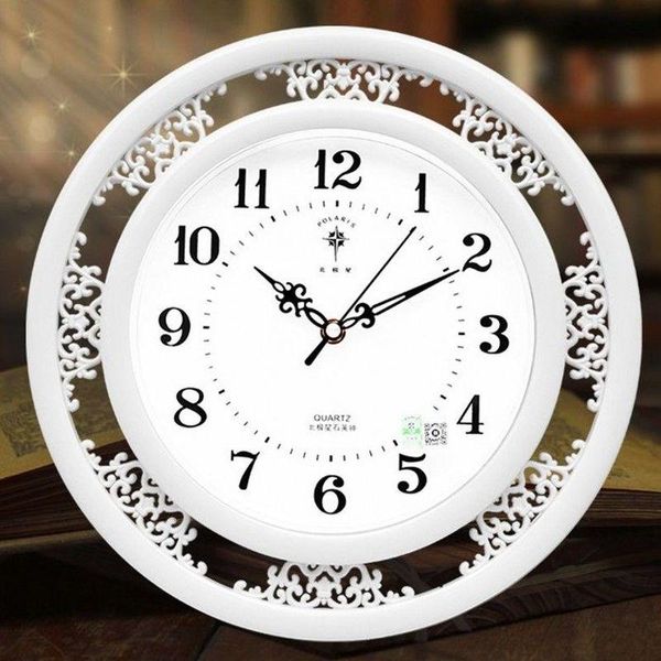 

wall clocks clock carved hollow chinese style creative simple mute living room retro quartz