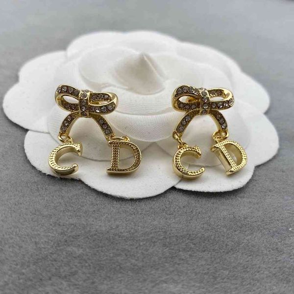 

75%off outlet bow studded with tassel letter earrings fashion, Silver