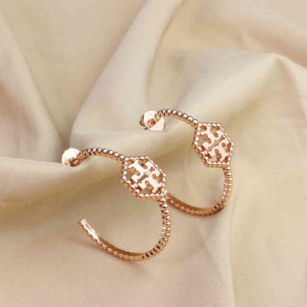 

chinese style products wind light luxury niche design feeling hollowed out hexagonal tb earrings plated with 18k gold exaggerated commuting
