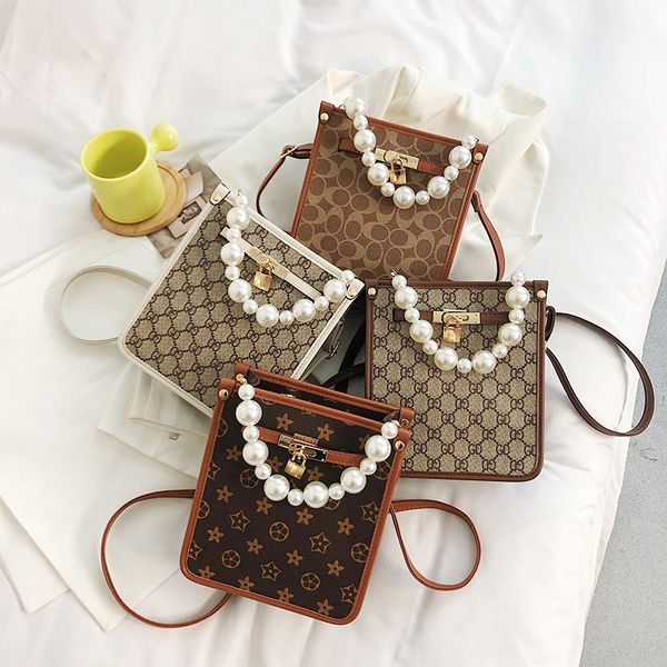 

outlet online 70% off sale 2021 summer new korean pearl handbag women's one shoulder dinner bag makeup mahjong bag