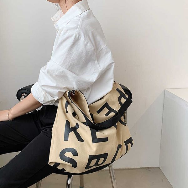

korean version ins simple and versatile letter canva's large capacity shopping lazy wind handbag