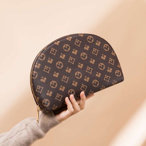 

2021 women's hand bag zero wallet travel wash bag portable cosmetic