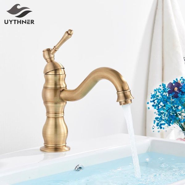 

antique brass bathroom basin faucet single handle swivel spout water mixer tap deck mounted bath wash sink faucets1